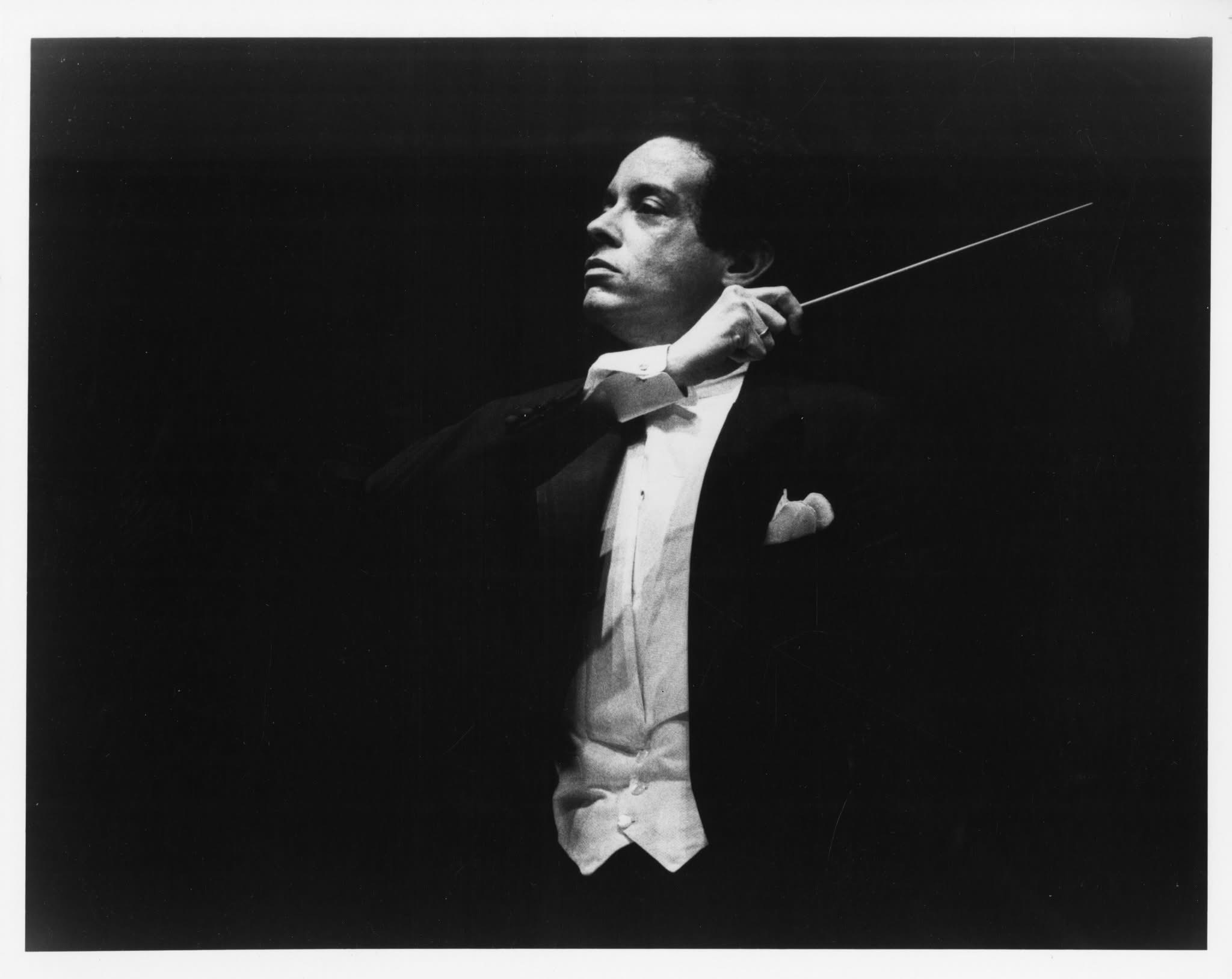 Isaiah Jackson conducting — formal portrait in white tie